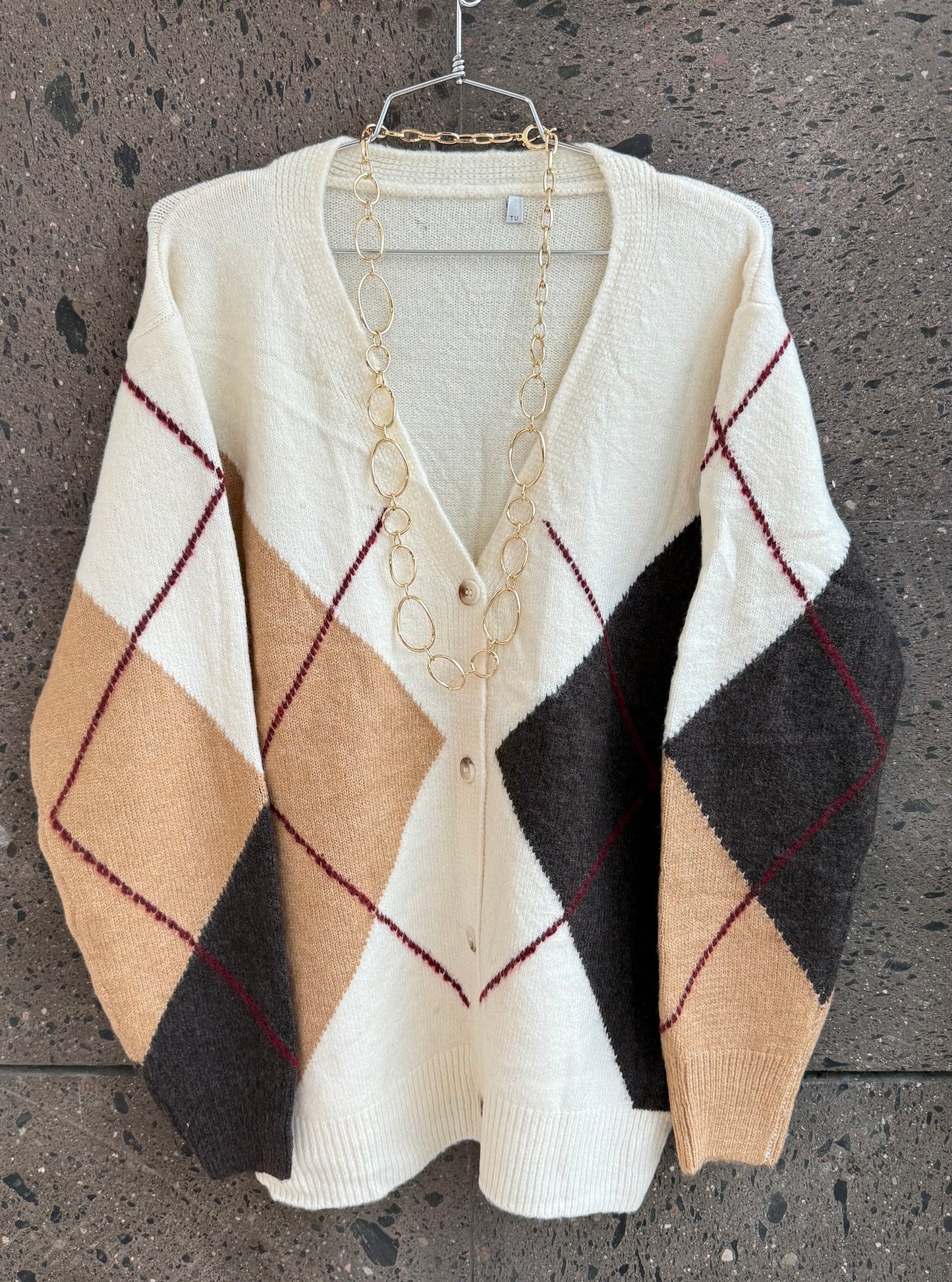 Sweter rombos chocolates