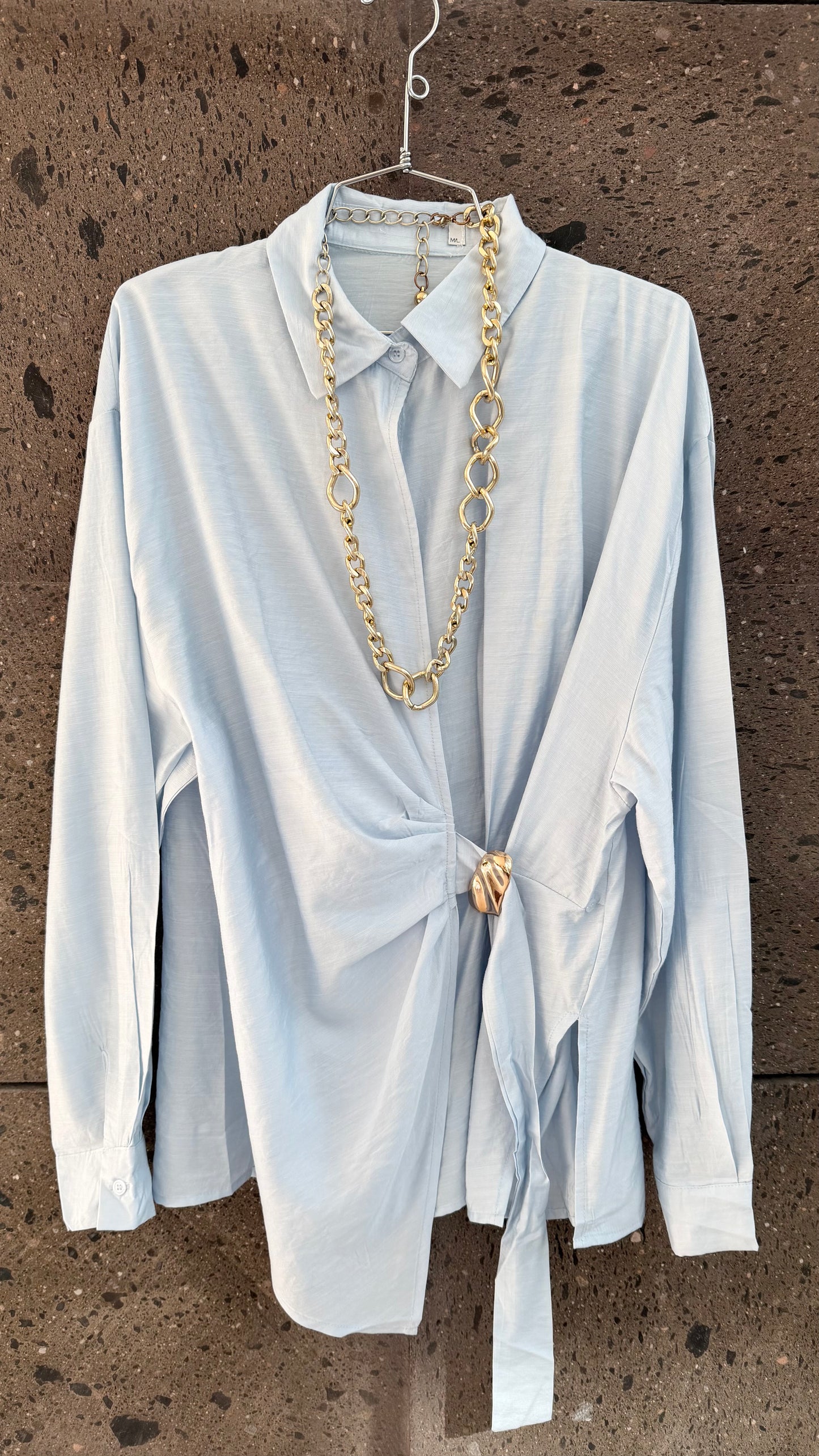 Blusón broche baby Blue