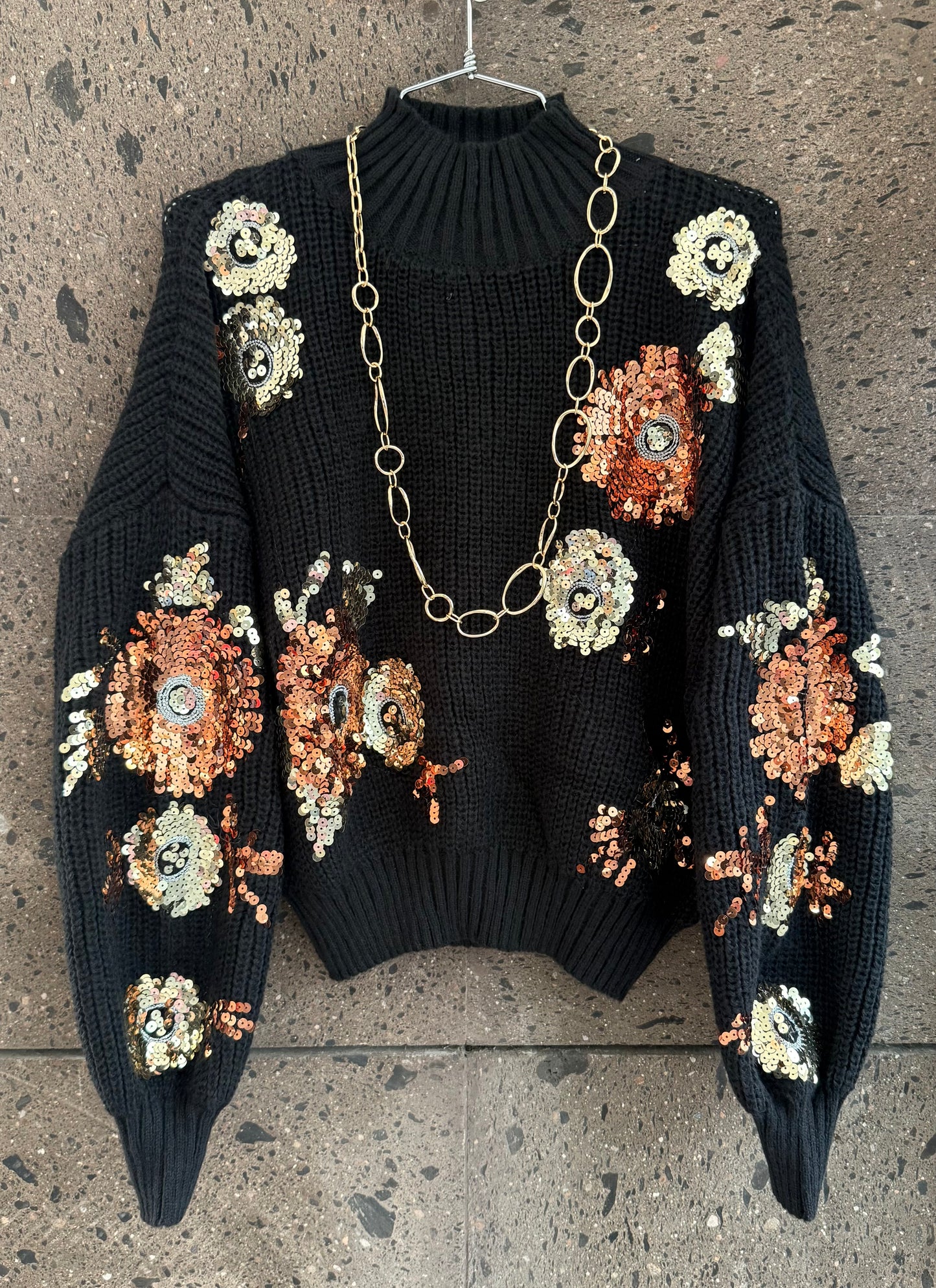 Sweter lentejuelas negro