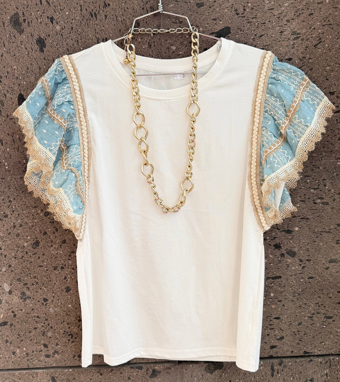 Blusa olan tira bordada