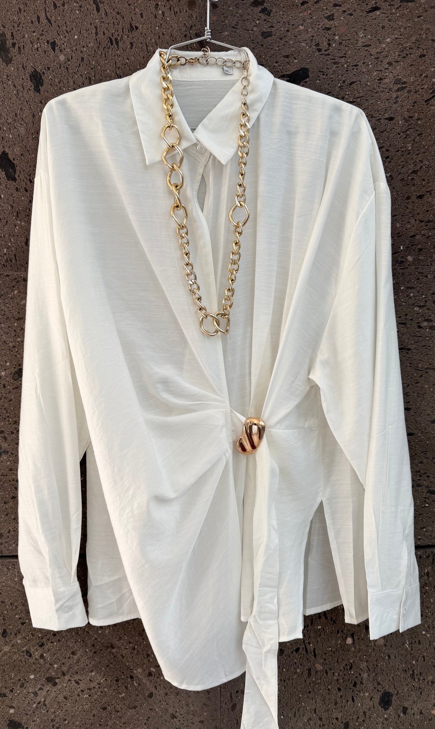 Blusón broche perla