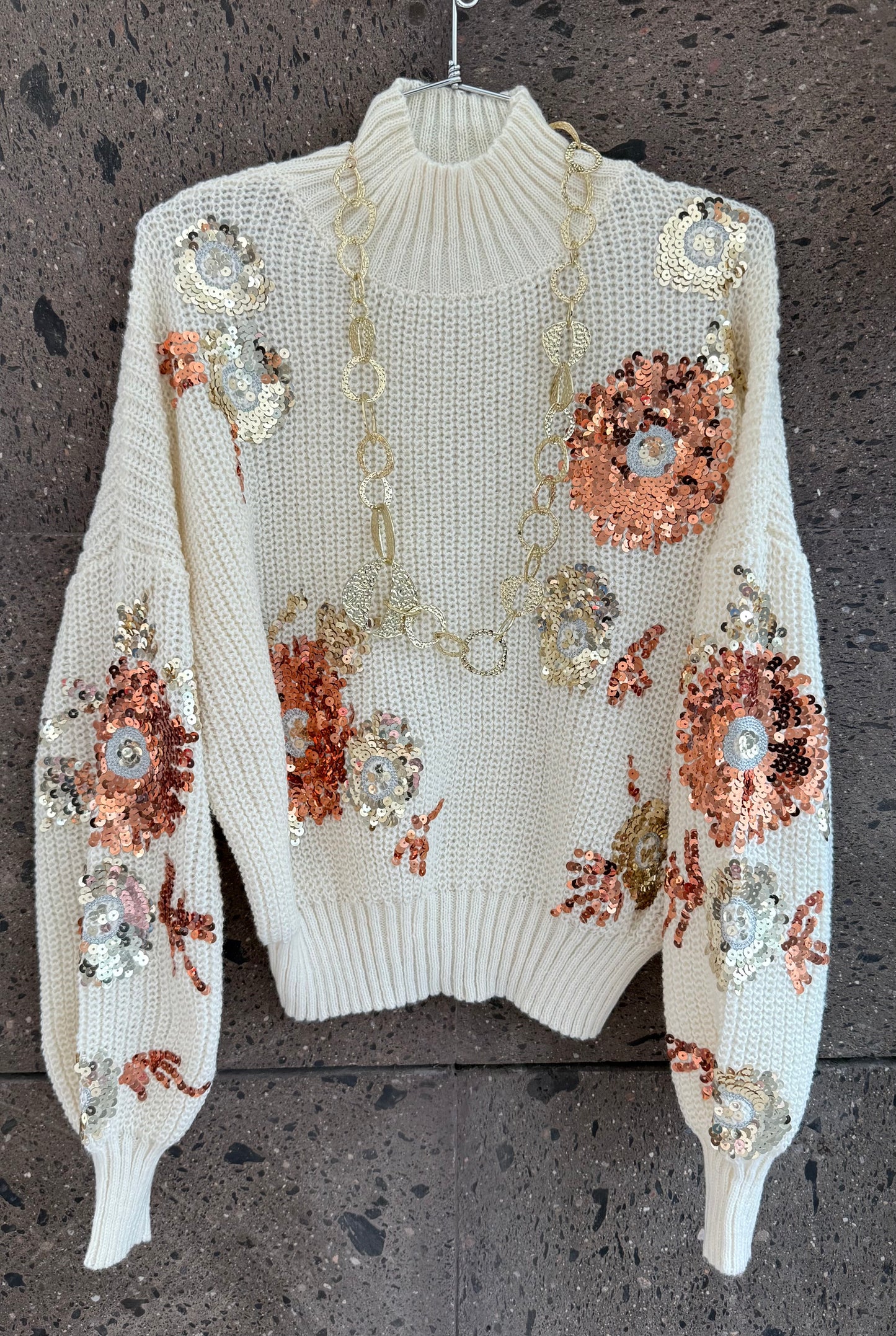 Sweter lentejuelas perla