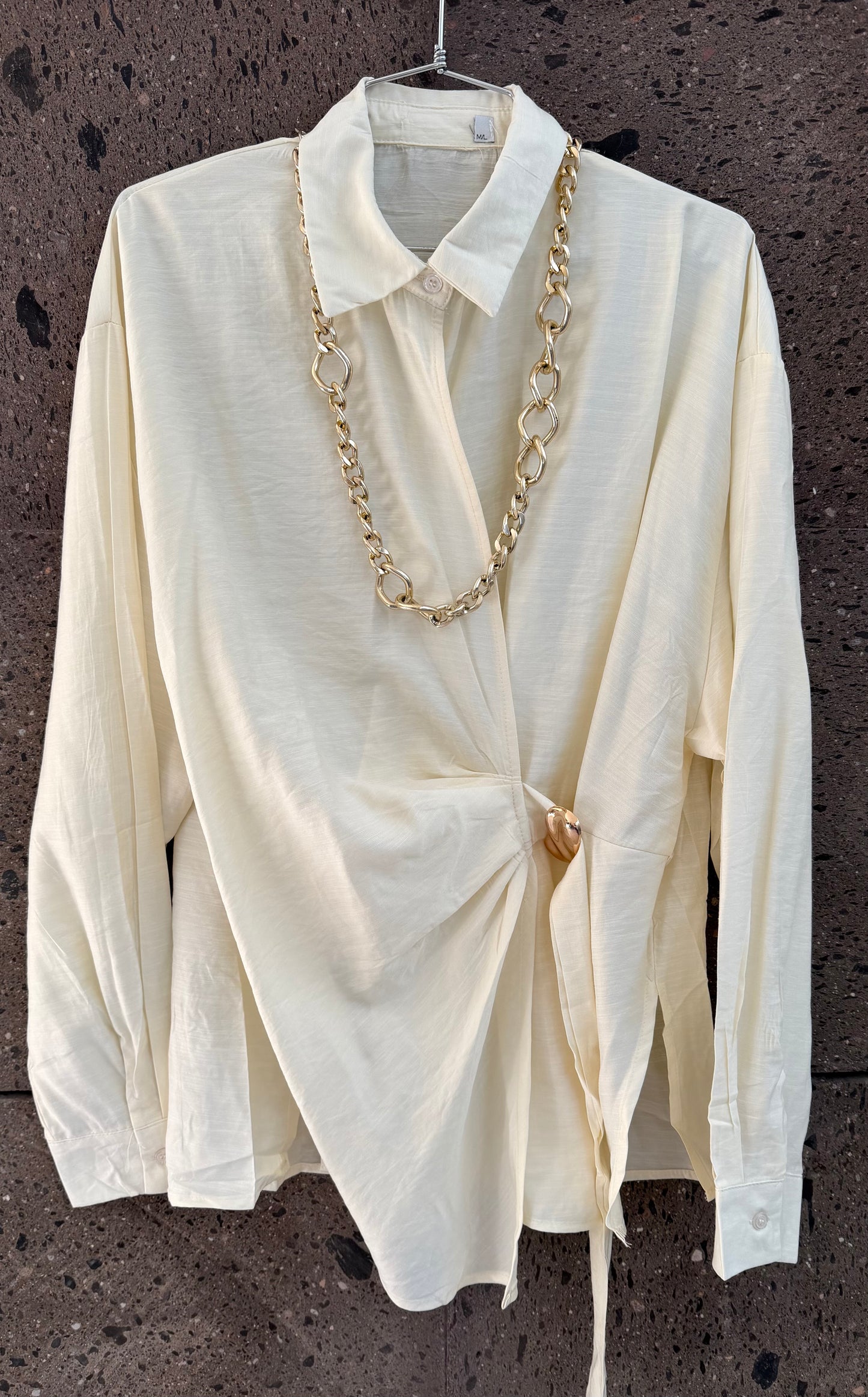 Blusón broche mantequilla