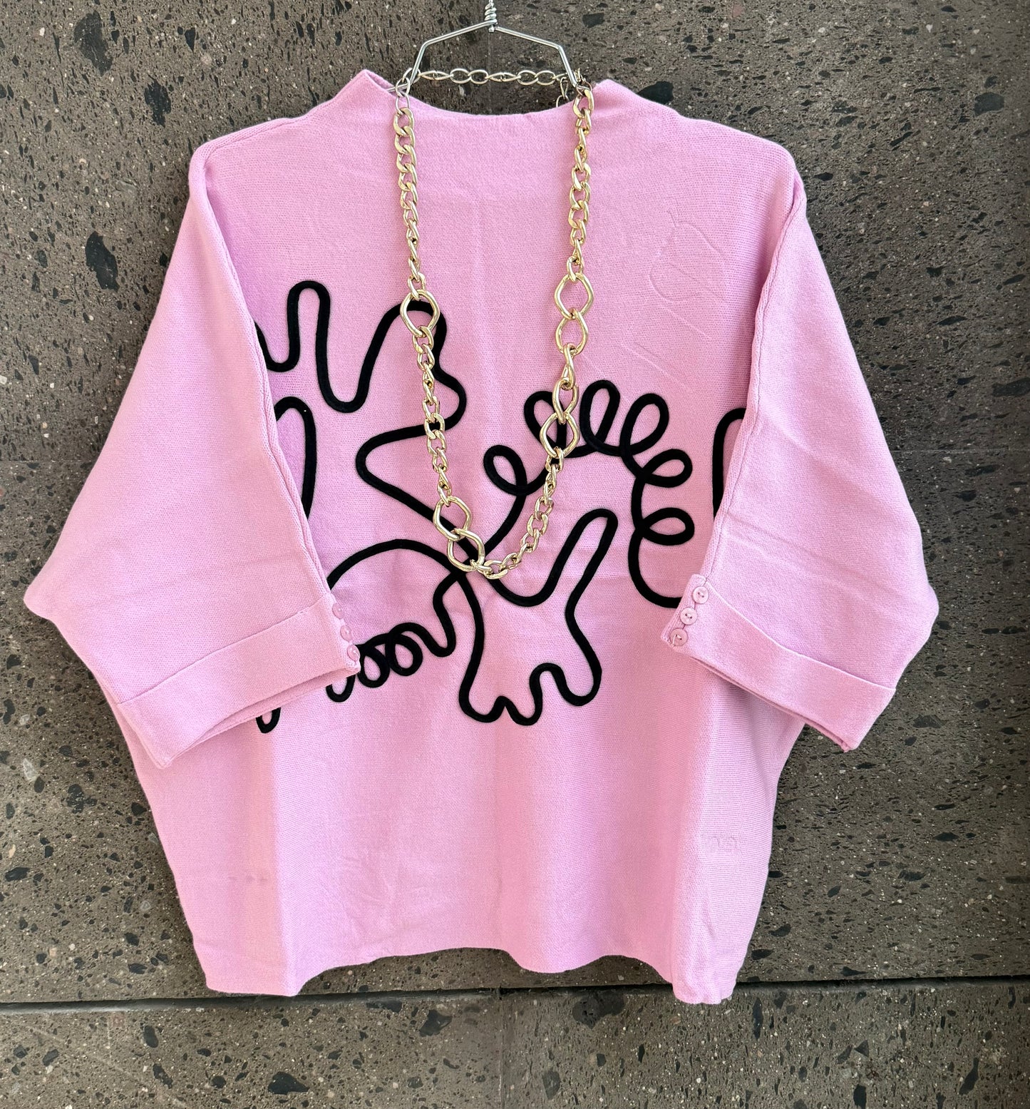 Sweter dibujo pink