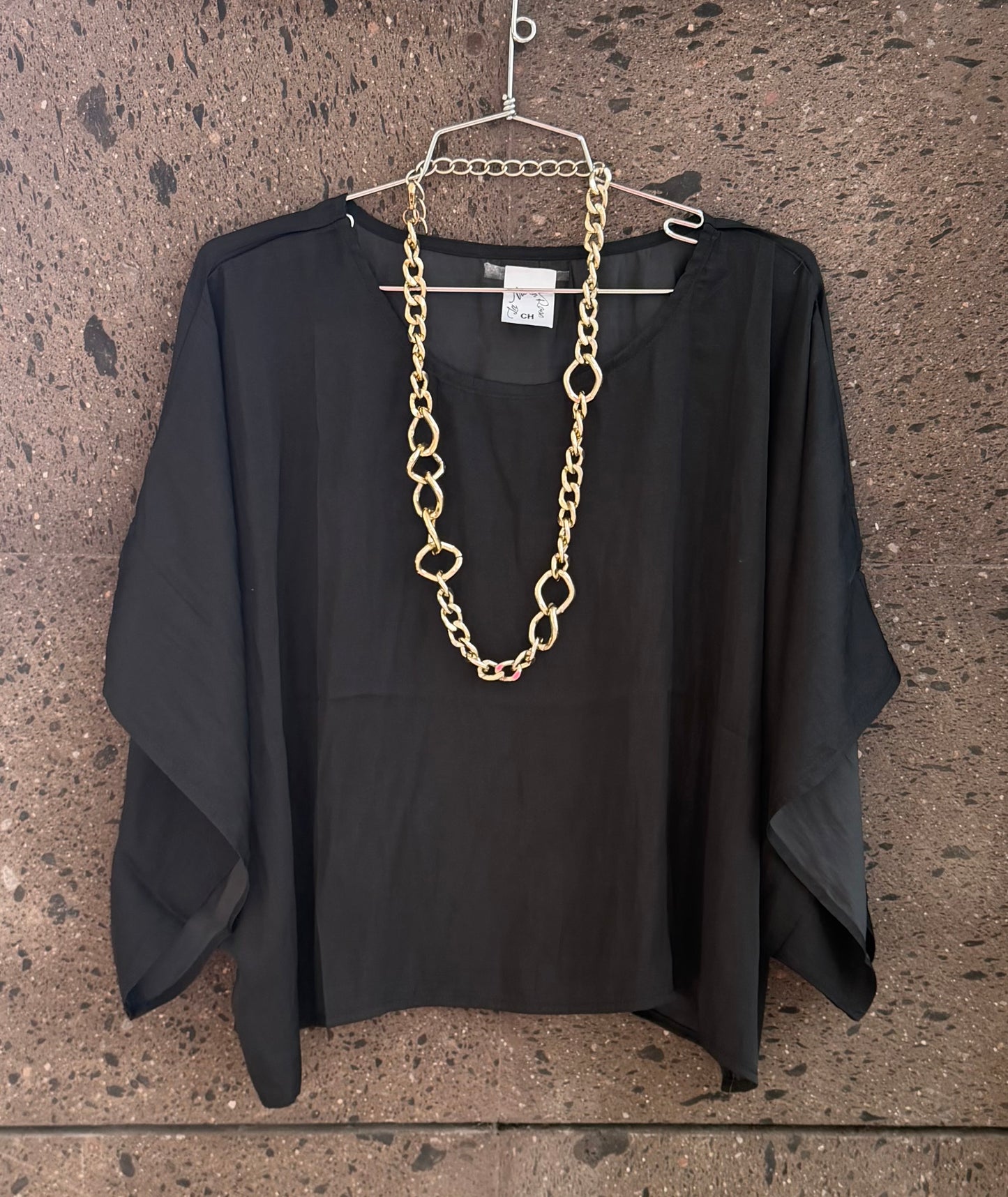 Blusa mariposa seda negra