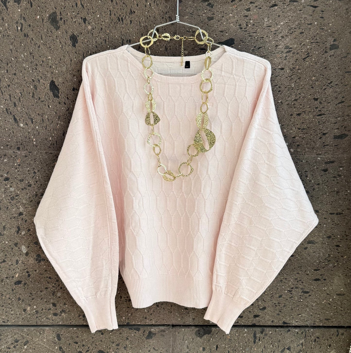 Sweter hombro caído baby Pink
