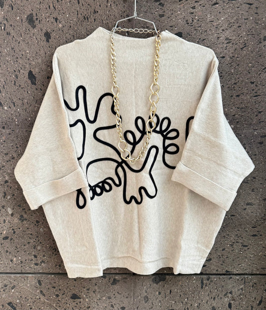 Sweter dibujo malva