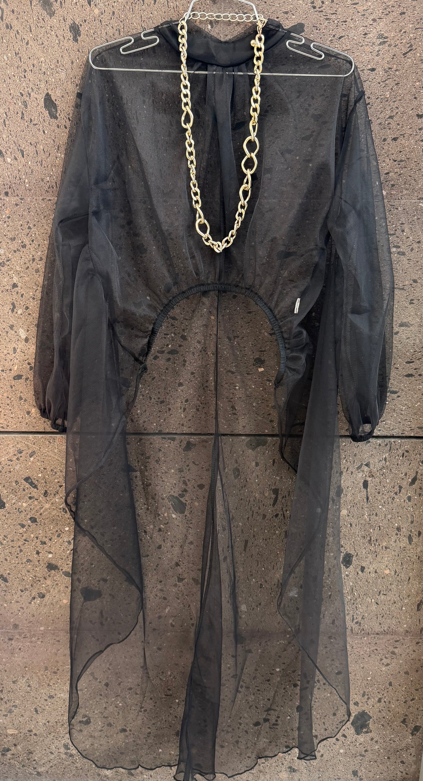 Blusa transparente negra