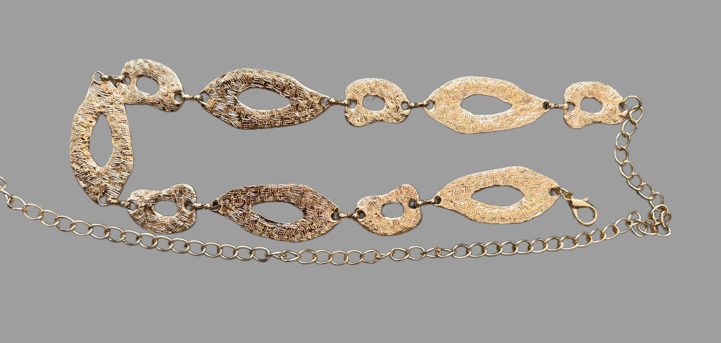 Cinturón cadena óvalo dorado