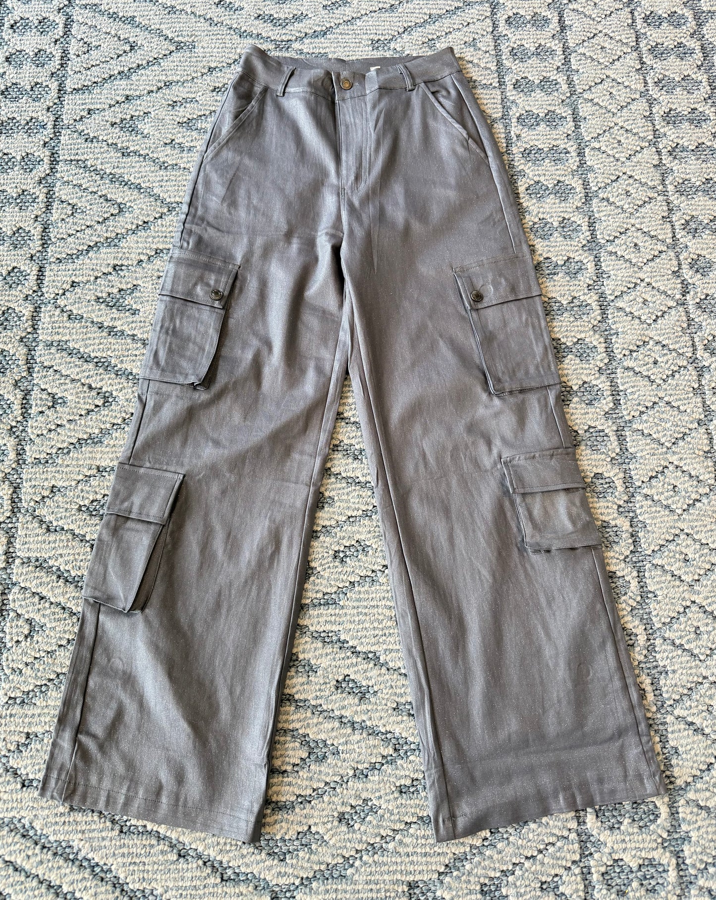 J pantalón metálico gris