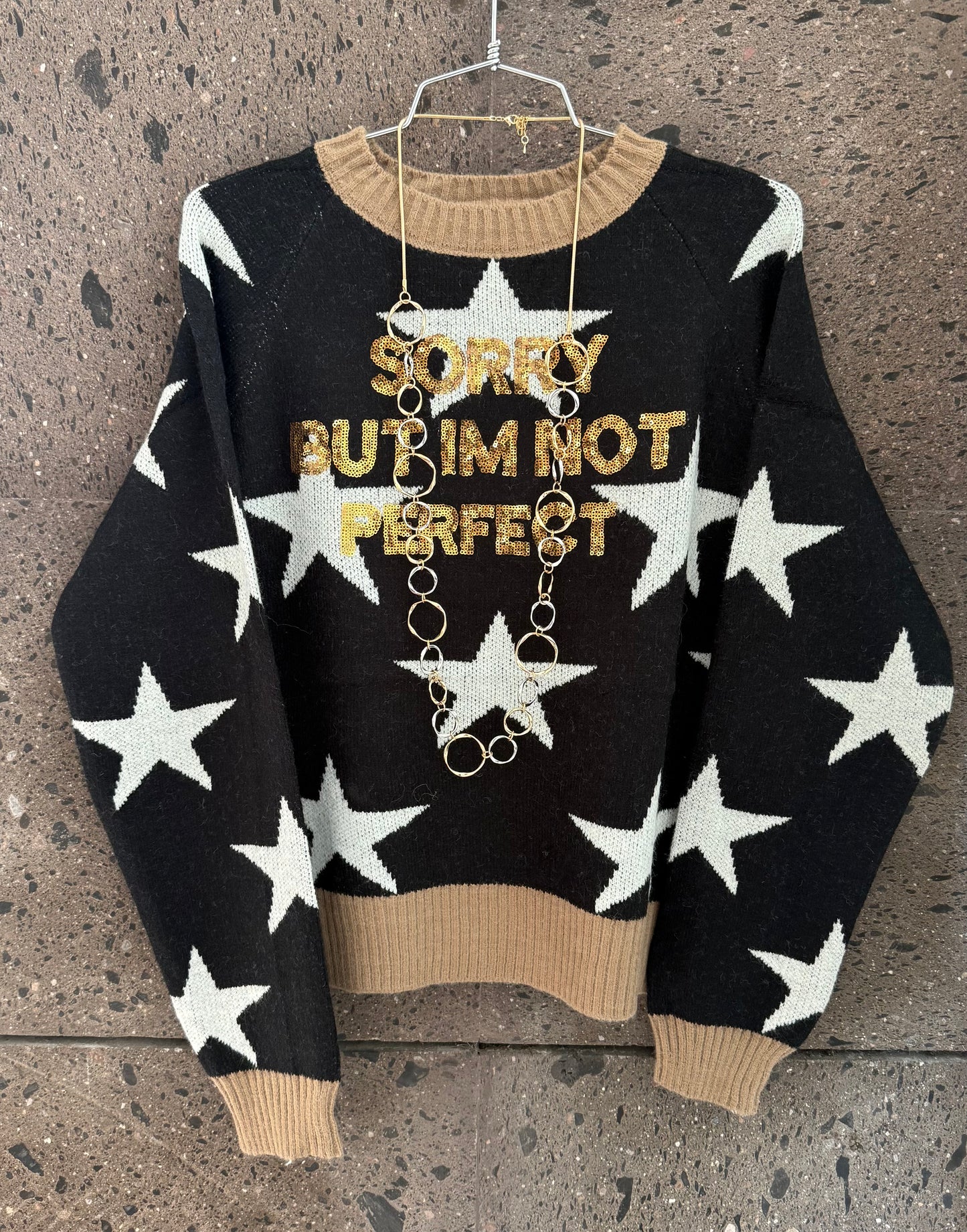 Sweter estrella negro